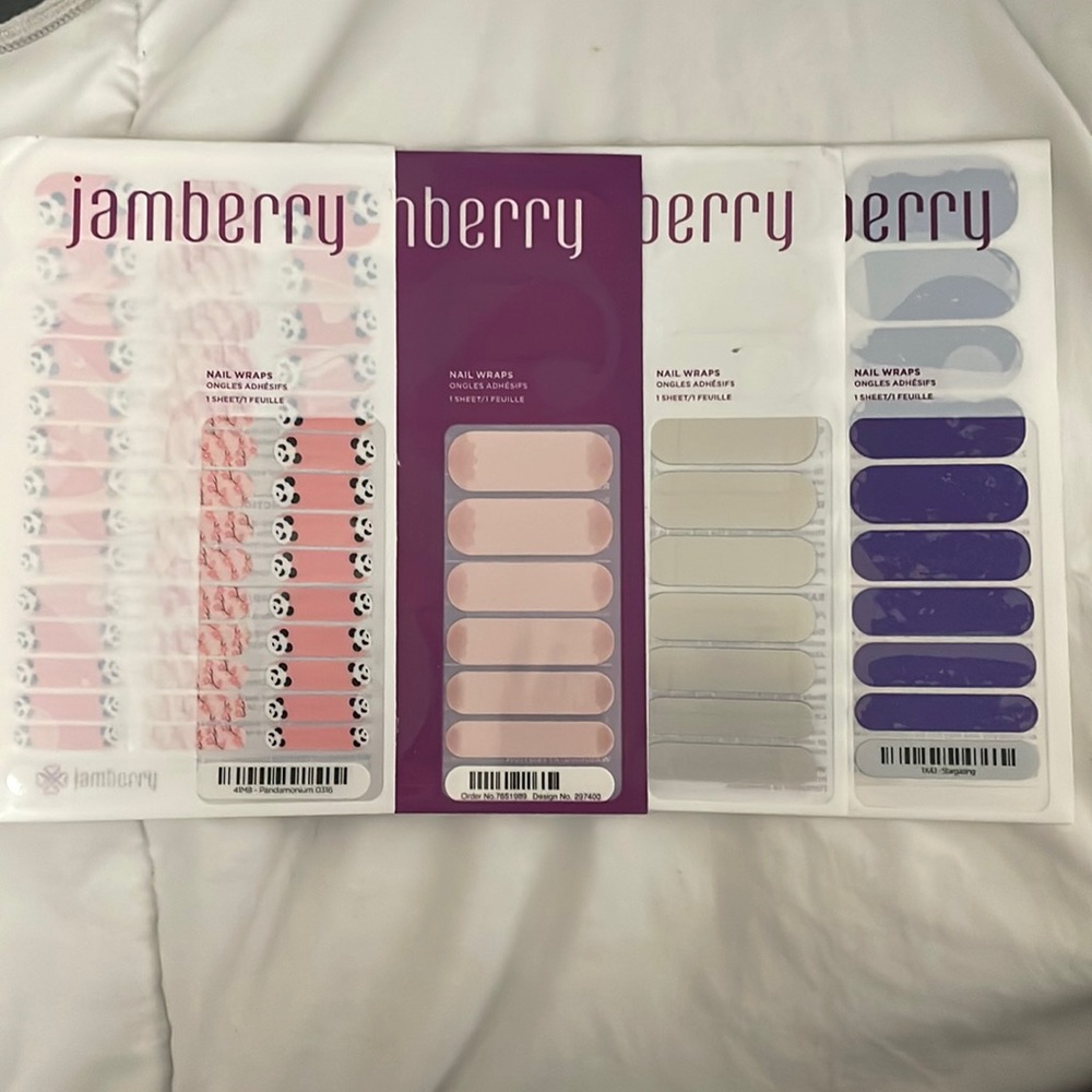 Four full Jamberry sheets in original package